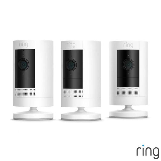 Set of three sleek white Ring Battery Stick Up Cameras with black lens covers and adjustable mounting stands displayed on a plain background.