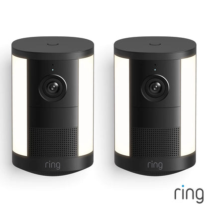 Matte black Ring Spotlight Cam 2nd Gen battery cameras shown as a set of two against a plain backdrop.
