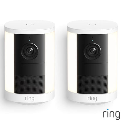 Ring Spotlight Cam 2nd Gen White Battery Security Cameras 2 Pack mounted on exterior wall showing spotlight, lens, and siren speaker.