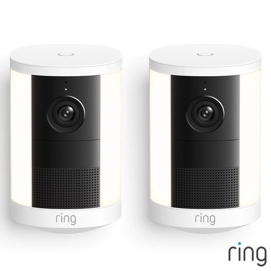 Ring Spotlight Cam 2nd Gen White Battery Security Cameras 2 Pack mounted on exterior wall showing spotlight, lens, and siren speaker.