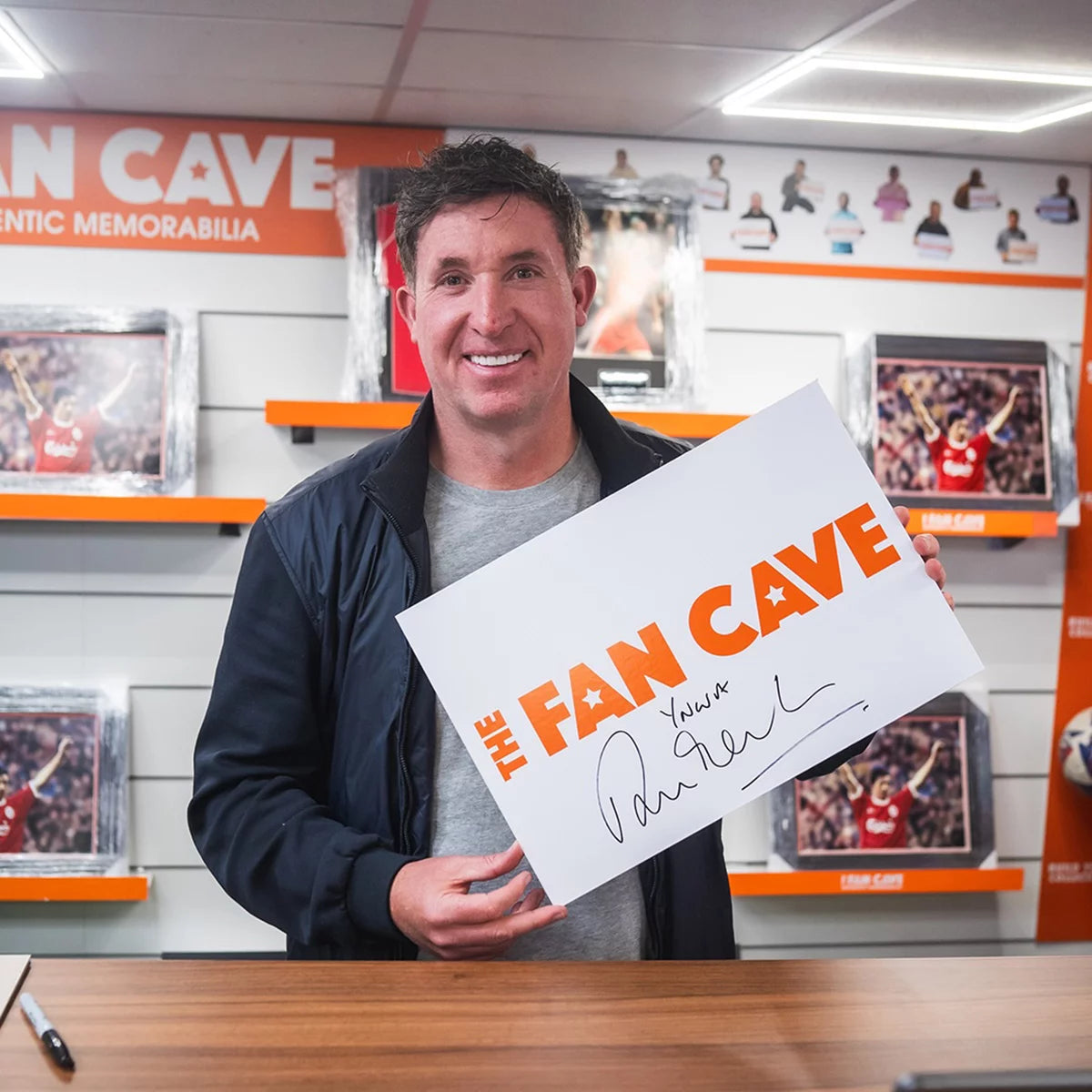 Authentic Robbie Fowler signed framed 16x12 Liverpool photo with a premium white mount and official COA.