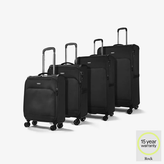 Nesting group shot of the Rock Georgia 4 Piece Softside Luggage Set displayed in three available colors, showing cabin, medium, large, and XL sizes with visible TSA locks and spinner wheels.