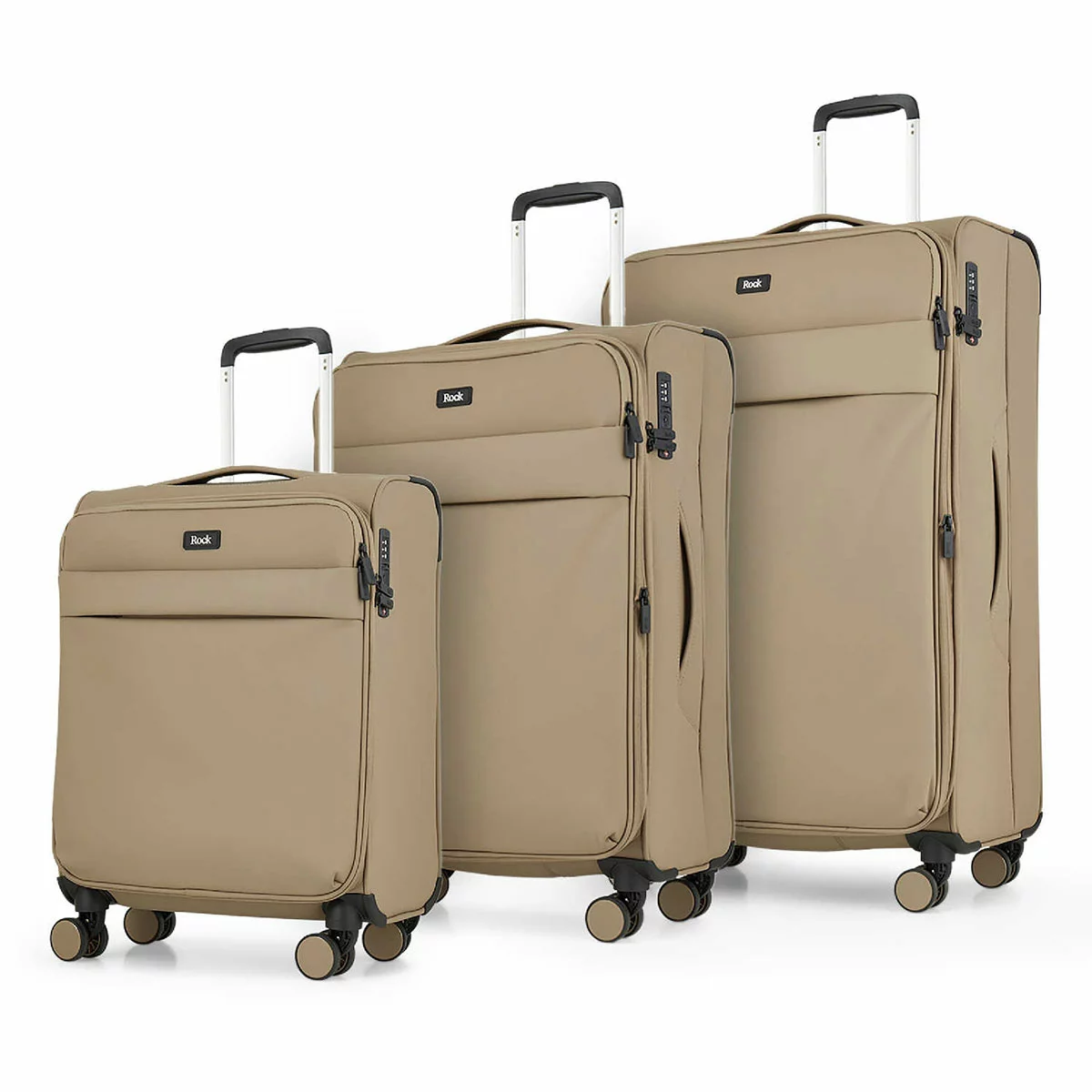 Front angle view of the Rock Harper 3 piece softside luggage set in charcoal grey showing nested cabin, medium, and large expandable suitcases on a modern airport lounge floor.
