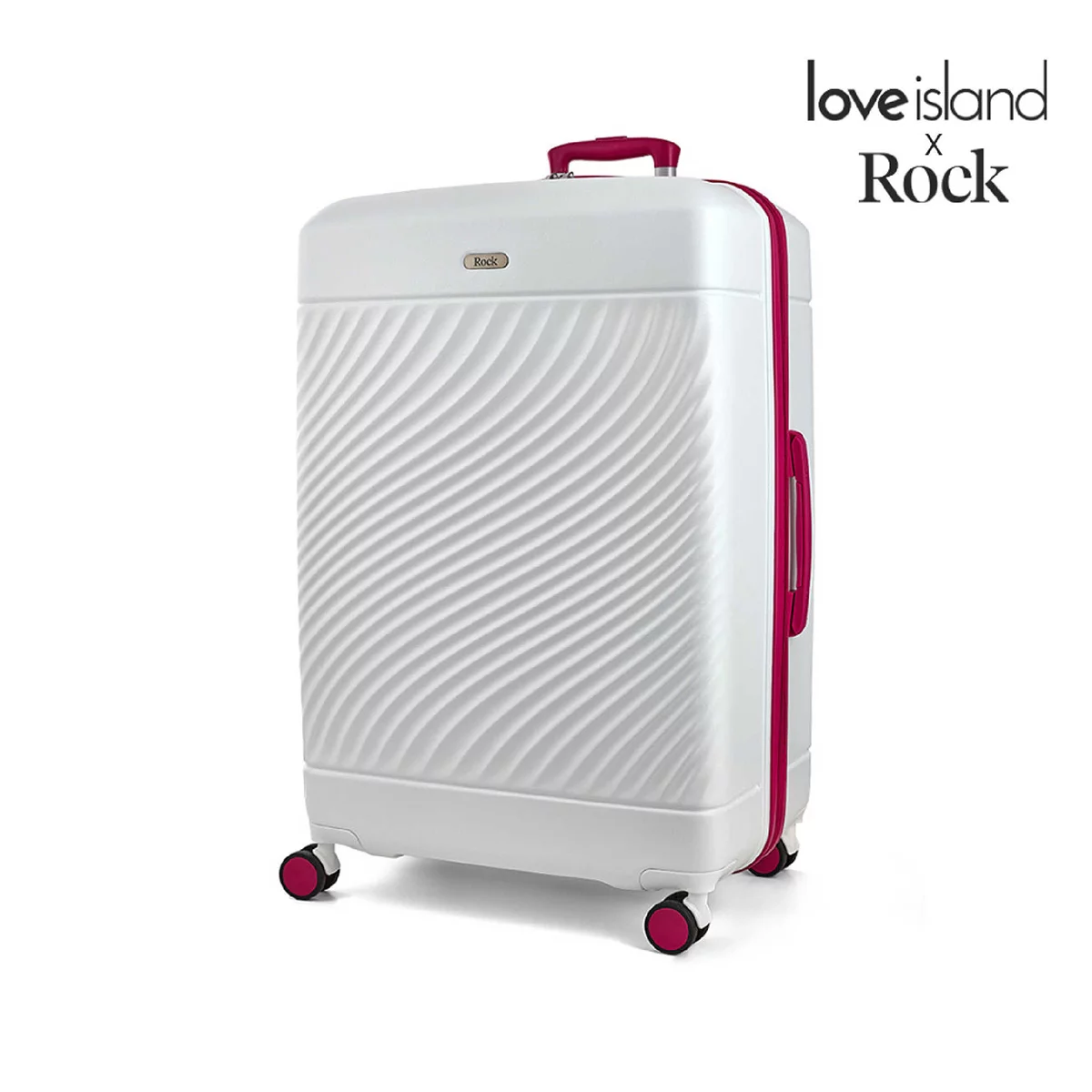 Front angle shot of the vibrant Rock Love Island hardside cabin suitcase standing upright on four double spinner wheels inside a modern airport terminal.