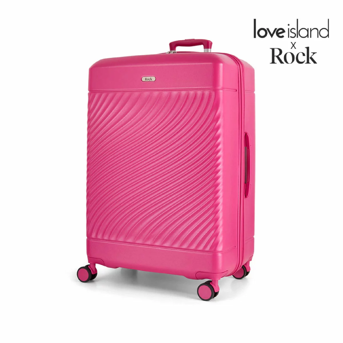 Front angle shot of the vibrant Rock Love Island hardside cabin suitcase standing upright on four double spinner wheels inside a modern airport terminal.
