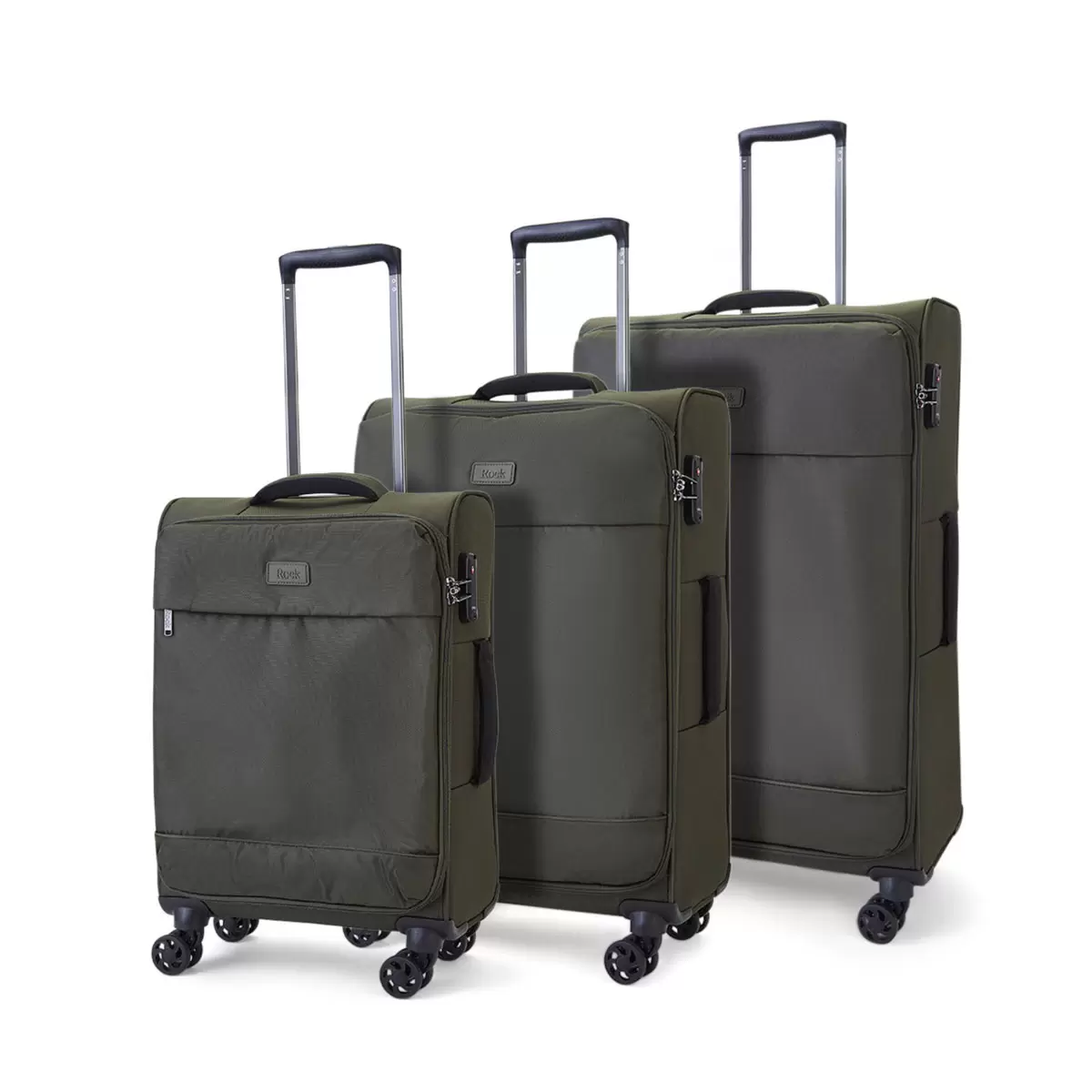 Rock Paris 3 piece softside luggage set displayed side by side in four distinct colors on a polished hardwood floor in a sunlit entryway.