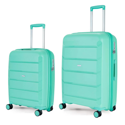 Rock Tulum 2 piece hardside luggage set showing cabin and medium suitcases stacked side by side in a sleek modern terminal.