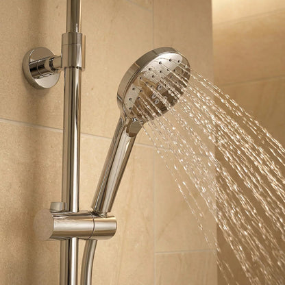 Polished chrome Roper Rhodes Hydroforce exposed bar shower system with 250mm circular overhead head and multi-function handset mounted on a light tile bathroom wall.