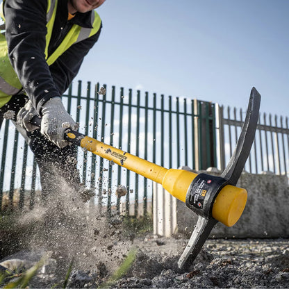 Flat lay of the 6 piece Roughneck tool kit featuring an 8lb sledge hammer, club hammer, bolster chisel, Gorilla bar, micro shovel, and pick axe on a concrete surface.