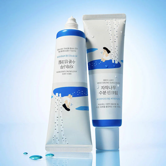 Two tubes of Round Lab Birch Juice Sunscreen standing upright against a clean, minimalist backdrop, highlighting the soft-touch packaging and fresh, clean aesthetic.