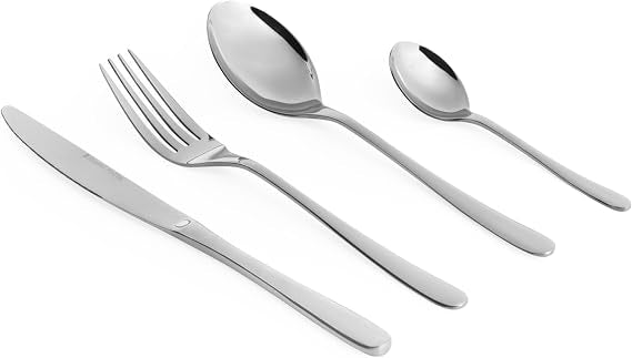 Four-person set of shiny silver Russell Hobbs Capri 18/10 stainless steel cutlery arranged neatly on a dark wooden dining table.