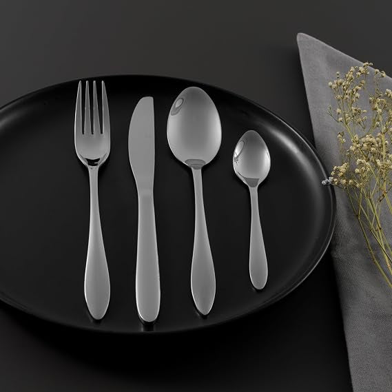 Polished silver 18/10 stainless steel Russell Hobbs Cologne 16 piece cutlery set in retail packaging showing fork, knife, dessert spoon, and teaspoon.