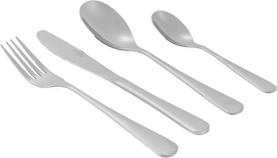 Front view of the 16-piece silver Russell Hobbs London stainless steel cutlery set arranged neatly on a wooden dining table.