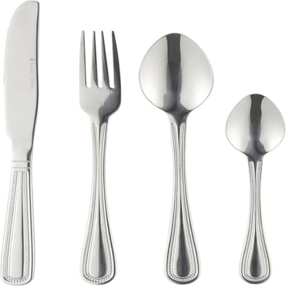 Top-down view of the silver polished Russell Hobbs Prague 24-piece cutlery set neatly arranged on a modern wooden dining table setting.