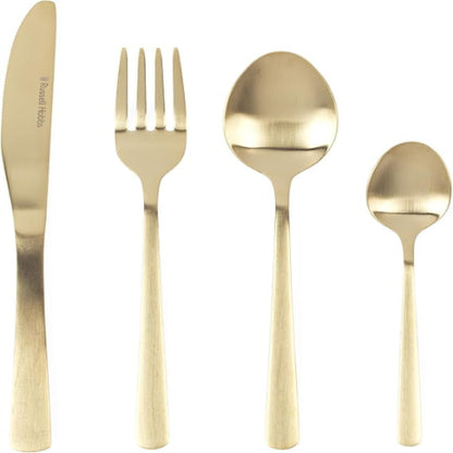 Top-down view of the 32-piece Russell Hobbs Vienna gold satin stainless steel cutlery set neatly arranged on a dark wooden table setting.