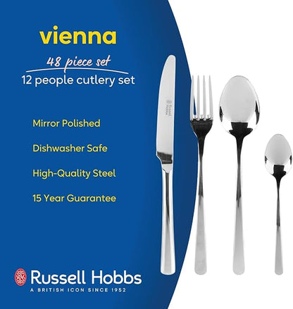 Top-down view of the 48-piece Russell Hobbs Vienna stainless steel cutlery set with a mirror polish finish arranged neatly on a wooden dining table.
