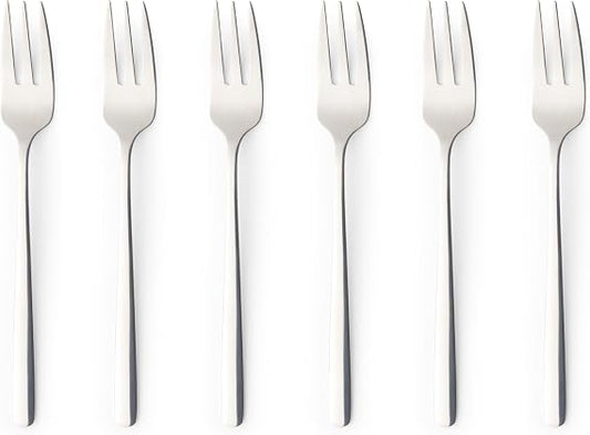 Six pack of silver polished 18/0 stainless steel Russell Hobbs Vienna dessert forks arranged neatly on a dark wooden dining table.