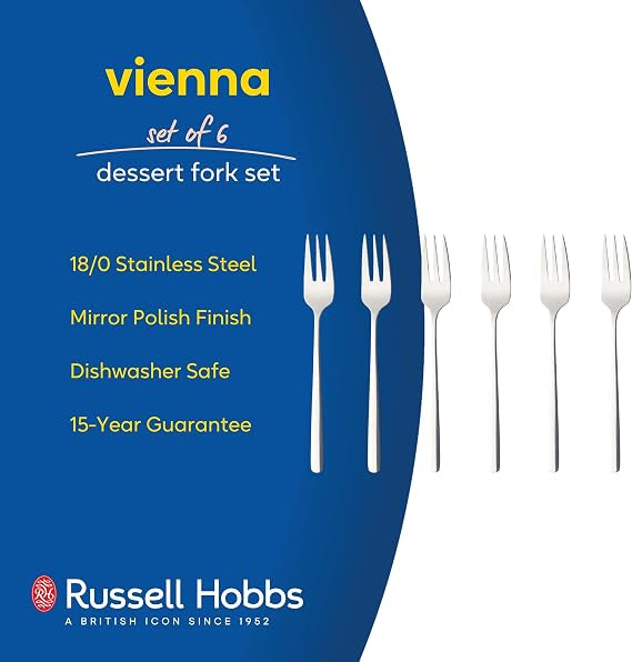 Six pack of silver polished 18/0 stainless steel Russell Hobbs Vienna dessert forks arranged neatly on a dark wooden dining table.