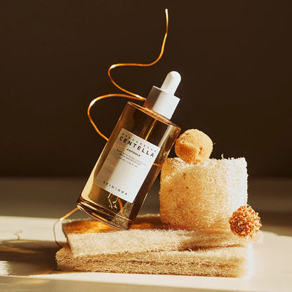 SKIN 1004 Madagascar Centella Ampoule collection, featuring two 120ml bottles and one 30ml bottle, presented against a clean, minimalist background.