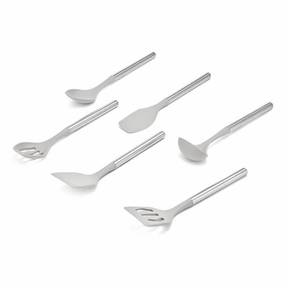 Top-down view of the 6-piece Sabatier silicone utensil set laid out on a dark granite kitchen countertop.