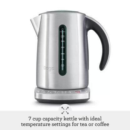 The stainless-steel Sage Smart Kettle Luxe with its backlit LCD display and ergonomic handle, shown on a clean kitchen countertop.