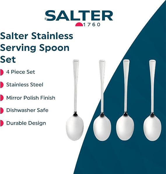 Four-piece Salter Buxton mirror polish stainless steel serving spoon set arranged on a dark wooden dining table next to a salad bowl.