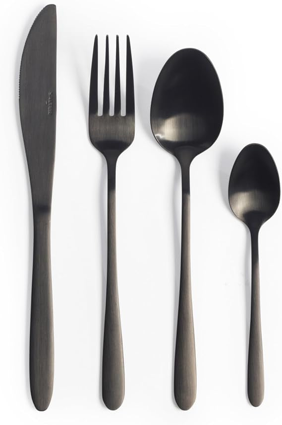 Overhead view of the 16-piece Salter Chiltern cutlery set in brushed matte black stainless steel arranged neatly on a dark slate dining table.