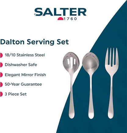 Salter Dalton three piece mirror polished stainless steel serving set featuring a solid spoon, slotted spoon, and fork laid out on a dark wooden dining table.