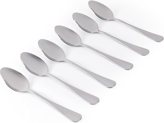 Six silver Salter Newbury polished stainless steel teaspoons neatly arranged side by side on a light wooden tabletop.
