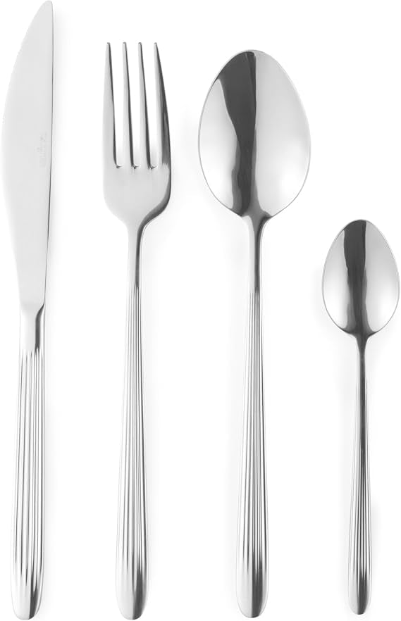 Salter Prestbury 16 piece silver stainless steel cutlery set arranged on a modern dining table showcasing a polished mirror finish.c