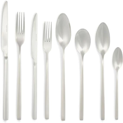 Silver Salter Winslow 44-piece polished stainless steel cutlery set arranged neatly on a dark wooden dining table setting.