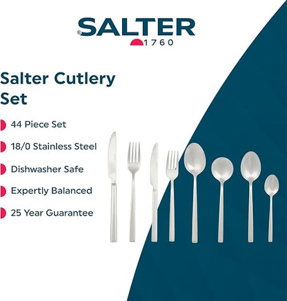 Silver Salter Winslow 44-piece polished stainless steel cutlery set arranged neatly on a dark wooden dining table setting.