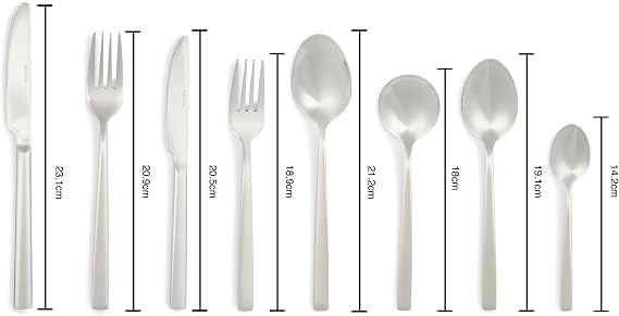 Silver Salter Winslow 44-piece polished stainless steel cutlery set arranged neatly on a dark wooden dining table setting.
