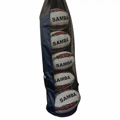 Five white and blue hand-stitched Samba Racer rugby training balls neatly stacked inside a clear nylon tube bag sitting on a green grass pitch.