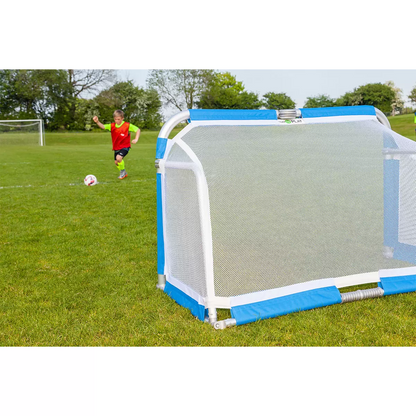 Pair of silver Samba 5ft x 3ft folding aluminium goals with black nets set up opposite each other on a green grass football pitch.