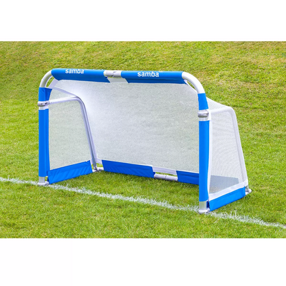 Pair of silver Samba 5ft x 3ft folding aluminium goals with black nets set up opposite each other on a green grass football pitch.