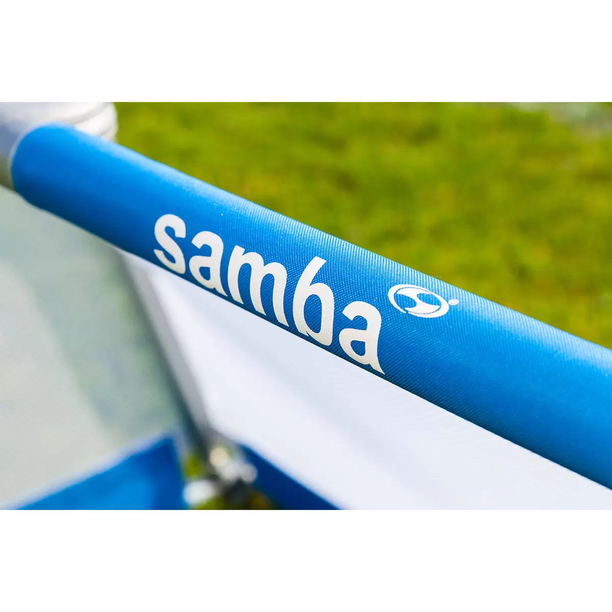 Pair of silver Samba 5ft x 3ft folding aluminium goals with black nets set up opposite each other on a green grass football pitch.