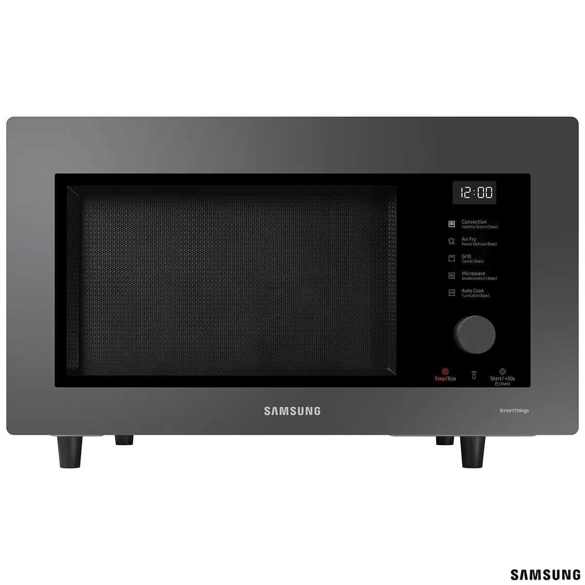 Black Samsung 32L smart microwave oven with glass door and digital control panel sitting on a contemporary kitchen countertop beside cooked food.