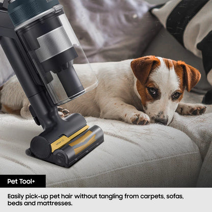 Sleek Samsung Bespoke Jet AI Lite Pro vacuum securely docked in its tall, black auto-emptying Clean Station on a modern hardwood floor.