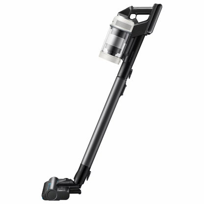 Sleek Samsung Bespoke Jet AI Lite Pro vacuum securely docked in its tall, black auto-emptying Clean Station on a modern hardwood floor.