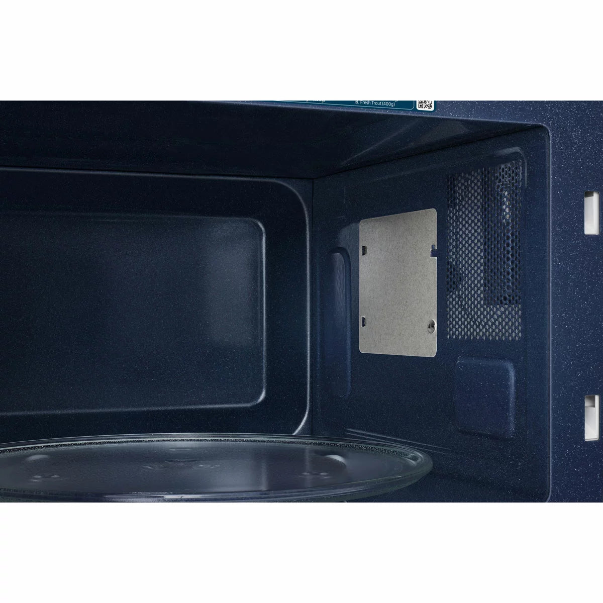 Front view of the sleek black Samsung MS32DG4504ATE3 32L solo microwave sitting on a modern kitchen countertop showing the glass door, digital display, and tactile control dial.