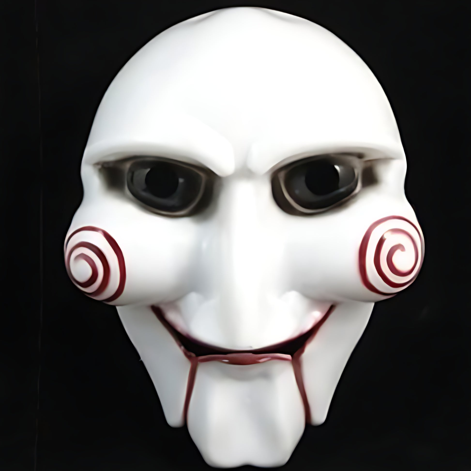 Front view of a white Saw Billy puppet horror mask with red spiral cheek details and red lips on a black background.
