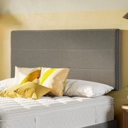 Front angle view of the Sealy Kingston Silver Fox fabric headboard showing detailed woven fabric texture mounted on a bed frame.