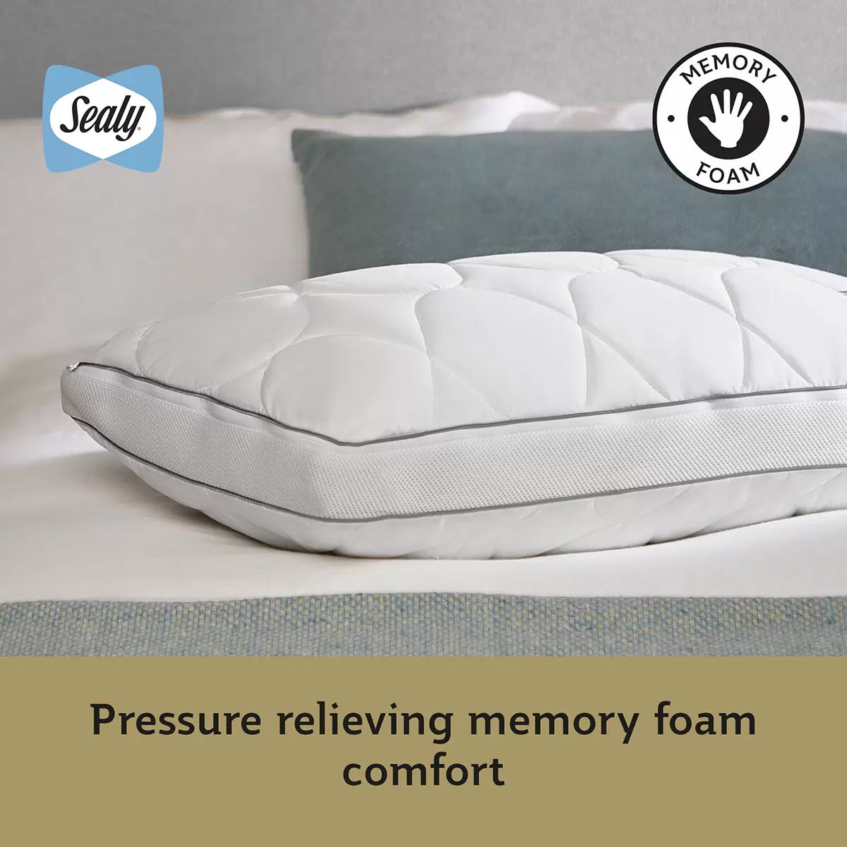 White Sealy Memory Airflow Pillow showing the quilted cotton surface and breathable grey air mesh sidewall details on a modern bed setup.