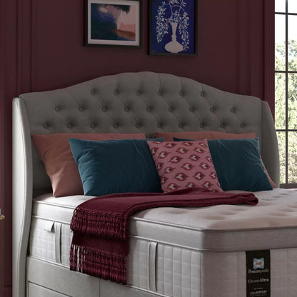 Front view of the Sealy Richmond full height king headboard in Silver Fox grey fabric featuring deep button-tufting against a modern bedroom backdrop.