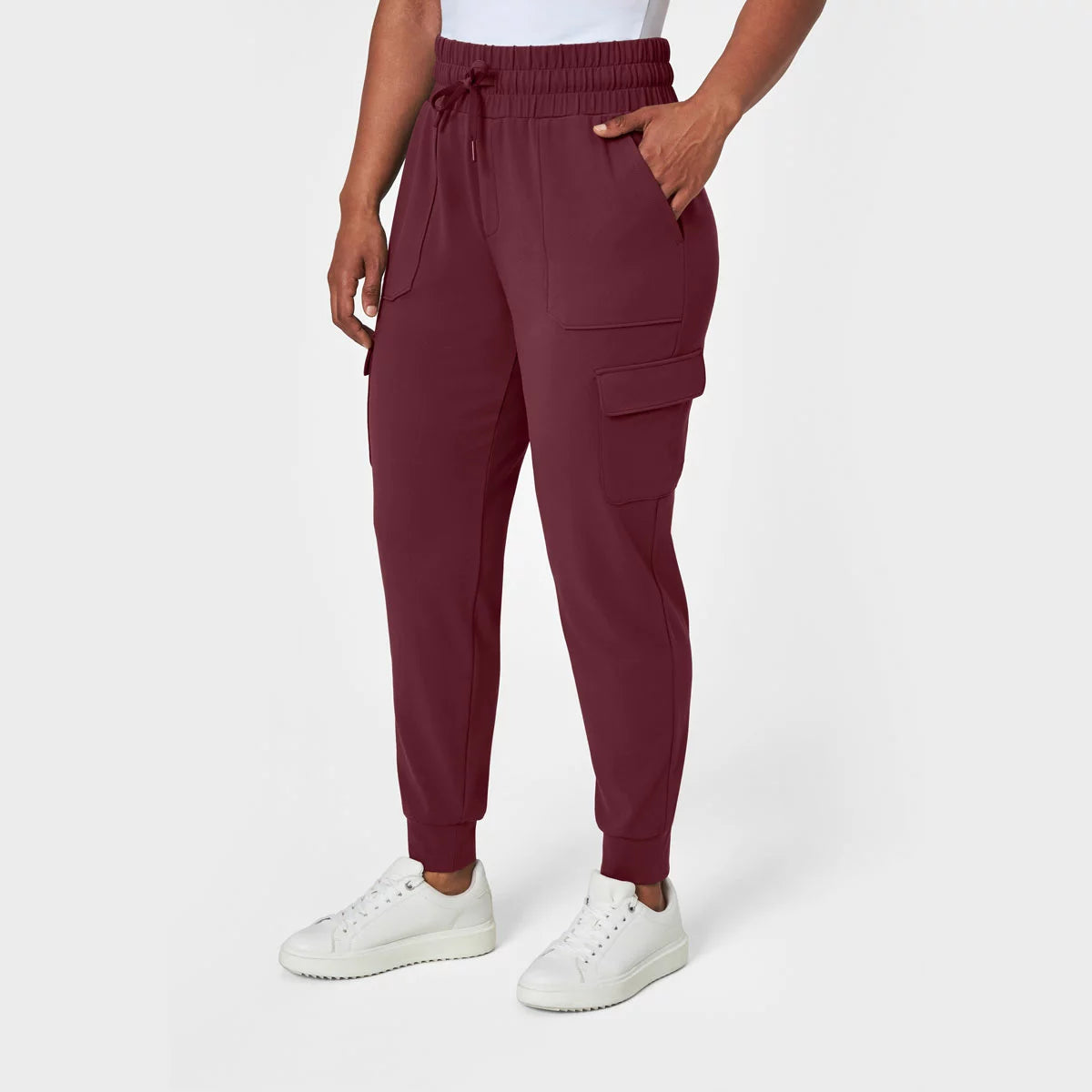 Mondetta Ladies Cargo Cuffed Jogger with stretch fabric, cargo pockets, and cuffed ankle design for comfortable everyday wear.