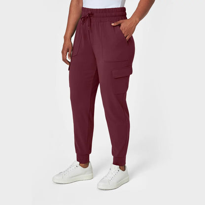 Mondetta Ladies Cargo Cuffed Jogger with stretch fabric, cargo pockets, and cuffed ankle design for comfortable everyday wear.