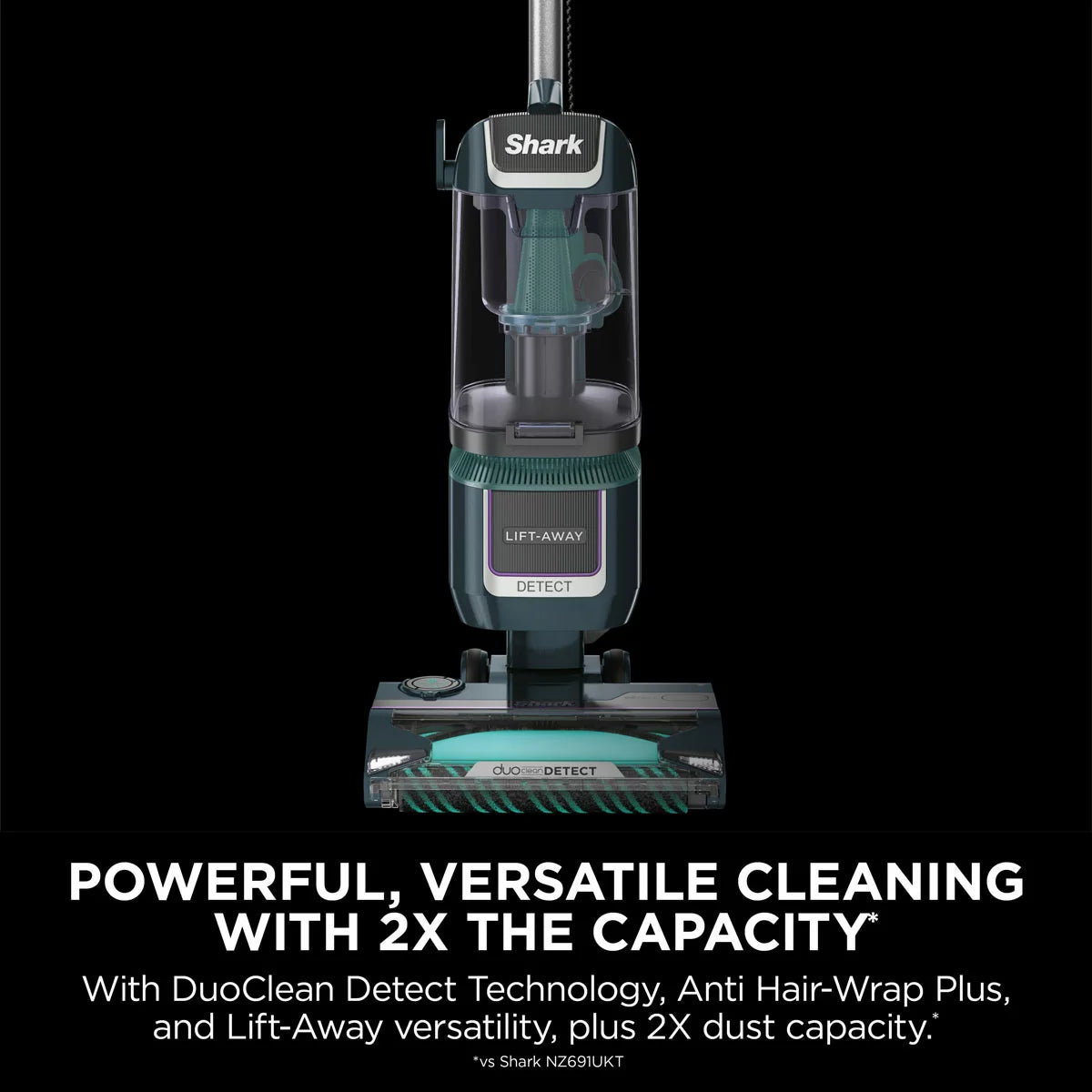 Front view of the navy and silver Shark Detect XL Pet Pro upright vacuum cleaner standing on a clean hardwood floor in a modern living room setting.