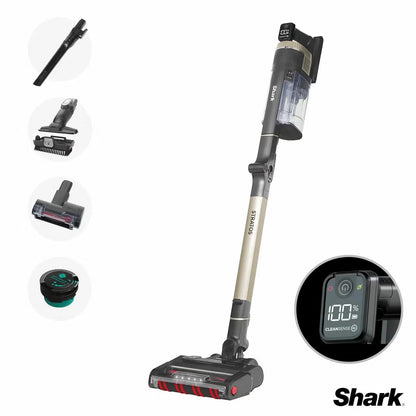 Front angle view of the charcoal grey and copper Shark IZ400UKT Stratos cordless vacuum standing on a wooden floor alongside pet accessories.