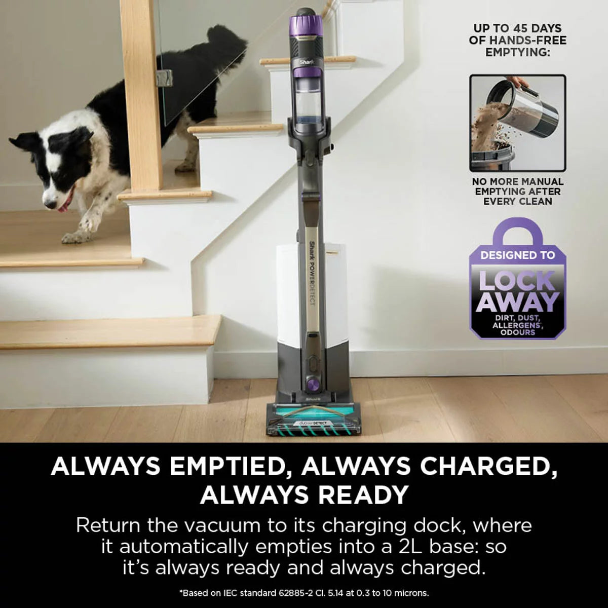 Front view of the dark teal Shark PowerDetect IP3251UKT cordless vacuum cleaner docked on its upright auto-empty charging base in a modern living room setting.